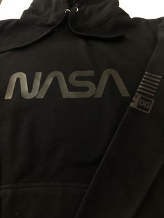 Nasa Black on Black Hooded Sweatshirt by threadsonfire.com Black Techwear Hoodie With Letter Print, Black Fleece Techwear Sweatshirt, Black Techwear Fleece Sweatshirt, Black Sporty Hoodie With Logo Print, Black Sweatshirt With Letter Print Techwear, Black Letter Print Sweatshirt Techwear, Black Fleece Hoodie With Letter Print, Black Hooded Sweatshirt With Logo Print, Sporty Hooded Tops With Branding