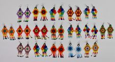 Huichol beaded woven by hand earrings. Mexican folk art. Very cool. Average Size Length- 3 inches Wide- 1 inch Native American Beadwork Patterns, Hand Earrings, Native American Beadwork, Beadwork Patterns, Handmade Glass Beads, Mexican Folk Art, Bead Weaving, Victorian Fashion, Festival Fashion