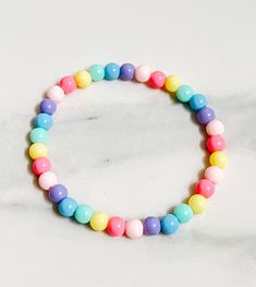 🍬Our pastel rainbow bracelet adds an adorable pop of color to your every day look! 🍬Perfect for bracelet stacks 🤩 🍬This bracelet makes the perfect gift for her, sister, girlfriend, child, teen, or anyone who is nostalgic of the y2k candy bracelets 😉 Y2k Candy, Candy Bracelets, Kawaii Bracelet, Candy Bracelet, Bracelet Stacks, Pride Bracelet, Rainbow Bracelet, Pastel Rainbow, Perfect Gift For Her