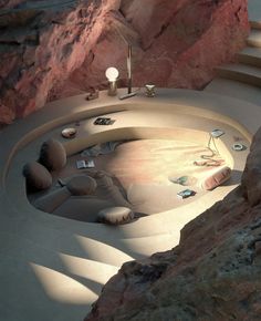 an unusual house built into the side of a mountain