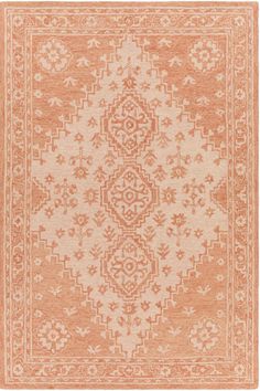 an orange and white rug with ornate designs on the front, in various colors and sizes