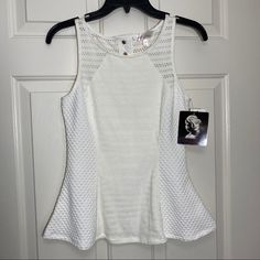 This Marilyn Monroe Sleeveless Peplum Top Has A Flattering Flare At The Bottom, 3 Fasteners Behind The Neck, And Back Zipper Closure. This Top Is Only Available In Size Small. - Measurements Shown In Photos. - Material Shown In Photos. - Size: Small - Condition: New With Tags. Flawless! All Orders Ship In 1-2 Business Days. I Accept Reasonable Offers. Thank You For Shopping My Closet. White Fitted Peplum Top, White Sleeveless Peplum Top Casual, White Peplum Top For Party, Elegant White Peplum Top For Summer, Fitted Peplum Tank Top For Spring, White Peplum Top, White Peplum Tops, Sleeveless Peplum Top, White Peplum