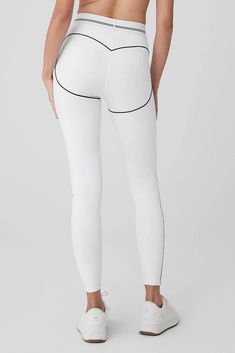 Hearts aren’t ready for the Airbrush High-Waist Heart Throb Legging. Designed with our signature cotton-y matte Airbrush fabric and contouring contrast stitching with sweetheart shaping in back, this elevated legging is dressed to impress for studios everywhere. Go for a full knockout look with a matching Airbrush Bra. White Fitted Bottoms With Contoured Waistband, Fitted White Bottoms With Contoured Waistband, White High Stretch Bottoms With Contoured Waistband, Fitted Athleisure Bottoms With Contrast Trim, Chic Fitted Bottoms With Contrast Trim, Heart Throb, Dressed To Impress, Black Sneakers, Alo Yoga