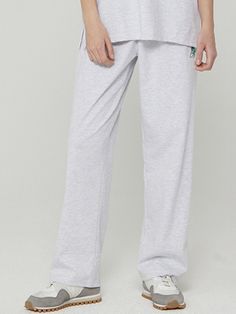 Editor's Notes Comfortable mood pants style that has a cozy mood perfect for casual fit for a workout wear. This is a cool cotton fabric with a double knitted cotton and functional polyester with a cooling effect. There's a signature embroidery of mellurbane that blends in with the ellipse line. This is great to style with the same design top hoodie to complete the overall comfortable outfit.- Design with minimal stretch, crease relief, and span for excellent activity- Standard fit- St Wide Leg Cotton Pants With Ribbed Waistband, Stretch Cotton Straight Leg Sweatpants, Stretch Cotton Sweatpants With Straight Leg, Cotton Stretch Sweatpants Straight Leg, Relaxed Fit Full Length Cotton Sweatpants, Stretch Cotton Pants With Straight Hem, Relaxed Cotton Pants With Straight Hem, Relaxed Cotton Pants With Comfort Waistband, Comfy Cotton Wide Leg Bottoms