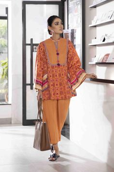 Sapphire Giana Intermix Collection 2021 Winter Long Sleeve Cambric Salwar Kameez, Traditional Cambric Salwar Kameez For Winter, Traditional Winter Salwar Kameez In Cambric, Winter Dabka Unstitched Cambric Suit, Unstitched Cotton Lawn Suit For Fall, Winter Lawn Suit With Printed Motifs, Cotton Sets With Printed Motifs For Fall, Winter Unstitched Lawn Suit With Printed Motifs, Traditional Winter Unstitched Suit With Printed Motifs