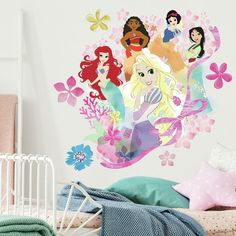 the disney princess wall decals are on display in this child's bedroom