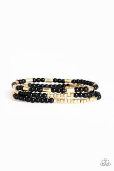 A dainty collection of black beads, shimmery gold cubes, and glistening gold accents are threaded along stretchy bands around the wrist, creating colorful layers. Sold as one set of three bracelets. P9DA-BKXX-111XX Gold Bracelet Set, Gold Bead Bracelets, Ball Necklace, Black Bracelets, Paparazzi Accessories, White Rhinestone, Paparazzi Jewelry, One Set, Silver Stars