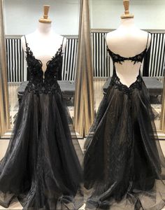 Backless Lace Bodice Gown For Prom, Backless Gown With Lace Bodice For Prom, Backless Prom Dress With Lace Bodice, Black Sleeveless Ball Gown For Party, Sleeveless Black Ball Gown For Party, Black Tulle Dress With Illusion Neckline, Backless Gown With Lace Bodice, Black Evening Dress With Illusion Neckline For Wedding, Backless Evening Dress With Lace Bodice