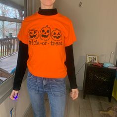 Cute Trick Or Treat Halloween Pumpkin Shirt. New Never Worn Except For These Pictures. Great For Fall Pumpkin Pictures Spooky Orange T-shirt For Fall, Casual Orange Tops For Halloween, Spooky Orange Crew Neck Top, Orange Crew Neck Top For Halloween, Spooky Long Sleeve Orange T-shirt, Spooky Long-sleeve Orange T-shirt, Spooky Orange Long Sleeve T-shirt, Spooky Orange Long Sleeve Tops, Orange Long Sleeve Spooky Top