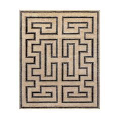 a rug with an intricate design on the front and back side, in black and beige