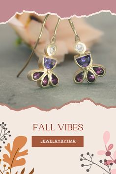 Embrace the intricate elegance of these unique gold earrings adorned with zircon, amethyst, and garnet. With their charming details and colorful drop-dangle design, they’re the perfect finishing touch for any evening ensemble. Thoughtful gift for her. Handmade with care, they bring a touch of artistry to any occasion.

#GemstoneJewelry #HandmadeJewelry #AmethystEarrings #GarnetEarrings #DangleEarrings #ChicJewelry #UniqueEarrings #ColorfulJewelry #Fallearing #AutumnAccessories #AutumnJewelry Gold Plated Dangle Jewelry With Gemstone Accents, Gold Plated Drop Earrings With Gemstone Accents, Dainty Sterling Silver Earrings With Gemstone Accents, Yellow Gold Gemstone Accented Drop Earrings, Amethyst Dangle Earrings Fine Jewelry, Fine Jewelry Amethyst Dangle Earrings, Purple Gold Plated Jewelry For Gifts, Fine Jewelry Amethyst Earrings With Gemstone Accents, Gold Plated Purple Jewelry For Gifts