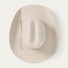 Crafted of high-quality 100% wool felt, this youth cowboy hat features a classic 3 7/8” cattleman crown and 3 1/2” brim and is finished with a grosgrain ribbon band. It has a stretch sweatband that’s sized to fit most young buckaroos with a head size up to 54cm. 3 7/8” Cattleman Crown 3 1/2” Brim Grosgrain Hatband Stretch Sweatband 100% Wool Felt Imported Grooming Shop, Cut Tees, Denim Boots, Fringe Jacket, Mini Shirt Dress, Hat Band, Cowboy Hat, Hat Shop, Grosgrain Ribbon