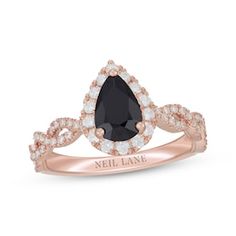 a rose gold ring with black and white diamonds