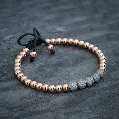 "top jewelry gifts for men and women, gifts for boyfriend, unique gifts ideasRose Gold bracelet made with 5mm (small size) rose gold plated steel beads, featuring Rose Gold plated spacer beads with Aquamarine zircon stones. It's adjustable, utilizing a sliding knot made with macrame cord and is easy to put on and take off by yourself. Please choose one of the 2 size options (For Men or Women) from drop down menu. Women`s Size: 6\" - 7.5\" (16 cm -19 cm) Men`s Size : 7\" - 8.5\" (18 cm -21 cm) Al