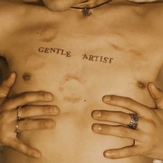 a man with his hands on his chest and the words gentle artist written on it