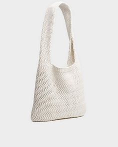 Our popular Addison is now available as a wide-strapped shopper bag. Designed with a sustainable cotton-blend knit, this carry-all has an interior back-wall pocket for your all your valuables. rag & bone Women's Large Addison Cotton Tote Bag | Light Dove White. Casual Tote Hobo Bag With Removable Pouch, Casual Hobo Tote Bag With Removable Pouch, Casual Everyday Hobo Bag With Double Handle, Casual White Hobo Bag With Double Handle, Everyday Natural Crochet Bag With Removable Pouch, Casual Crochet Shopping Bag With Large Capacity, Casual Natural Canvas Bag For Shopping, Spring Cotton Hobo Bag, Chic White Woven Hobo Bag