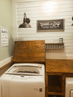 a washer and dryer in a small room