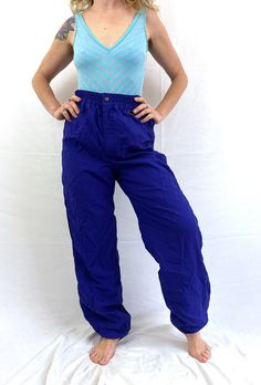 Nice 80s Nils ski pants! Size 32 Made in the USA  Zips in the front Nylon, lined Zips on the sides as well Lying flat... 14" to 18"across waist ~22" across hips ~33" inseam ~45" top to bottom of pants Great vintage condition 90s High Waist Winter Bottoms, 90s Style Relaxed Fit Winter Bottoms, 90s Stretch Cotton Bottoms, Fitted 90s Style Winter Bottoms, Casual Full Length Pants For Ski Season, Casual Skiing Pants, 90s Style Cotton Parachute Pants, Casual Full Length Skiing Pants, 90s High Waist Cotton Parachute Pants