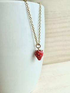 These dainty strawberry necklaces are made of the followings: (1) Gold plated strawberry charm (size: 12 x 8 mm) (2) Gold plated necklace chain ✏️ Please choose your desired color of strawberry charm ✏️ Please choose the length of the chain (the length includes clasp and findings). ❣️ If you are unsure about which length to choose , please leave me a note to request an extension chain to be added to the chain at check out. 🍓 MORE STRAWBERRY NECKLACE 🍓 → https://www.etsy.com/listing/666509218 → Red Enamel Charm Necklaces For Gifts, Small Red Jewelry Perfect For Gifting, Small Red Jewelry For Gift, Dainty Enamel Jewelry Gift, Dainty Red Necklace With Lobster Clasp, Valentine's Day Gift Enamel Charm Necklaces, Valentine's Day Gift Enamel Charm Necklace, Cute Red Charm Necklace For Gift, Cute Red Charm Necklaces For Gifts