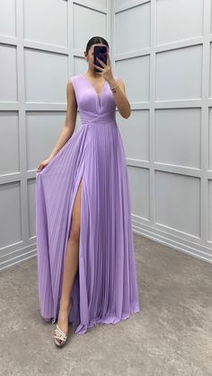 This stunning evening dress features a fabric blend of 50% cotton, 35% polyester, and 15% elastane. Find the essential washing instructions conveniently provided on the product label.  Model's Measurements: Height: 1.73 meters - 5'8 Bust: 86 cm - 34 inc Waist: 62 cm - 24 inc Hips: 94 cm - 37 inc Weight: 55 kg - 121 lbs If you are unsure about your size please message me your height and weight. So i can recommend the correct size for you. Fitted A-line Dress With Accordion Pleats, Sleeveless Pleated Midi Dress For Banquet, Pleated V-neck Dress For Gala, Ruched Dress For Spring Banquet, Spring Banquet Dress With Ruched Detail, Fitted Pleated Maxi Evening Dress, Fitted Pleated Maxi Length Evening Dress, Pleated Fitted Maxi Evening Dress, Floor-length Pleated Dress For Banquet