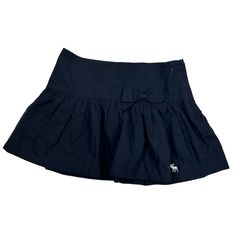 Abercrombie Skirt Comes from a smoke free, pet friendly home Womens skirt Preowned, vintage condition Womens size 26 Photos are part of the items description Measurements are: 15 inch waist  14 inches top to bottom Navy Check out my other items in my store! JE Solid Color Pleated Tiered Skort, School Uniform Lined Skirt, Pleated Skirt For School Uniform, Fitted Mini Skirt For School, Solid Color Tiered Skort With Lined Skirt, Lined Tiered Skort, Tiered Lined Skort, Solid Color Tiered Lined Skort, Fitted Skirted Shorts With Ruffles