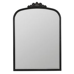 an ornate black framed mirror on a white background with clipping for text or image