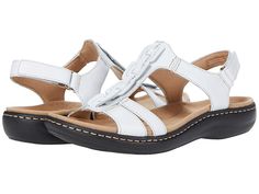 Clarks Laurieann Kay - Women's Shoes : White Leather : The perfect pairing for your warm-weather ensemble is the Clarks Laurieann Kay sandal. Slip on sandal features stylish leather upper and adjustable ankle strap with hook-and-loop closure. OrthoLite footbed ensures all-day comfort with every step. Lush leather uppers with textile lining for elevated detailing. Imported. Adjustable hook-and-loop closure for fit preference. Weight of footwear is based on a single item, not a pair. Clarks brande Casual T-strap Sandals With Adjustable Round Toe, Casual T-strap Sandals With Round Toe And Adjustable Strap, Spring T-strap Footbed Sandals With Removable Insole, Casual Synthetic T-strap Sandals With Adjustable Strap, Casual T-strap Sandals With Adjustable Straps For Spring, Comfortable Adjustable Ankle Strap Sandals, Casual Spring T-strap Sandals With Adjustable Straps, Comfortable Sandals With Adjustable Strap And Round Toe, White Casual Slingback Sandals With Leather Footbed