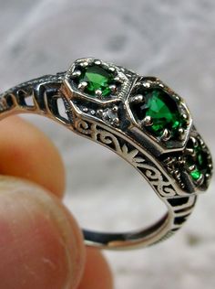 Art deco style ring with three green emeralds set in sterling silver filigree Antique Mens Rings, Silver Emerald Ring, Mystic Fire Topaz, Edwardian Ring, Natural Emerald Rings, Gemstone Art, Gem Ring, Green Gems, North South