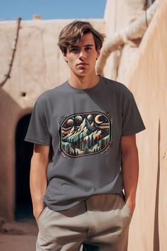 Artistic Mountain Graphic Unisex T-Shirt - 100% Ring-Spun Cotton, Lightweight, Classic Fit, Ethically Produced Material 🧵: This unisex t-shirt is made from light-weight fabric at 4.5 oz/yd² (153 g/m composed of high-grade 100% ring-spun US cotton for enduring comfort. Heather colors and sports grey include polyester. Durability 🛡️: The pre-shrunk fabric ensures consistent fitting. The shoulders have twill tape for improved durability. The collar is made with ribbed knitting to prevent curling damage. Ethical Production 🌐: Proudly made with US cotton that is responsibly grown and harvested, aligning with the ethical standards of the US Cotton Trust Protocol. This tee is certified by Oeko-Tex for safety and quality assurance. Fit 👕: A classic fit for ultimate comfort in casual to semi-fo Artistic Relaxed Fit T-shirt With Custom Artwork, Artistic T-shirt With Custom Artwork, Relaxed Fit, Artsy Crew Neck T-shirt With Graphic Design, Graphic Tee With Custom Artwork And Relaxed Fit, Relaxed Fit Graphic Tee With Custom Artwork, Relaxed Fit Crew Neck T-shirt With Custom Artwork, Artistic Shirt With Custom Artwork And Crew Neck, Artistic Graphic Crew Neck T-shirt, Artsy Graphic Crew Neck T-shirt