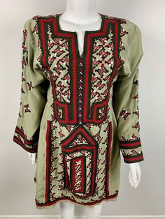 Afghan Vintage Balochi Embroidered Dress Size: Length: 37 inches  Bust (front): 17.5 Sleeve Length: 22 Shoulders: 16 Folk Style Fitted Embroidered Dress With Long Sleeves, Traditional Long Sleeve Green Embroidered Dress, Traditional Green Embroidered Long Sleeve Dress, Fitted Long Sleeve Dress With Multicolor Embroidery, Fitted Long Sleeve Embroidered Dress With Multicolor Embroidery, Green Traditional Tunic For Spring, Folk Style Long Sleeve Fitted Embroidered Dress, Traditional Green Embroidered Dress For Spring, Folk Style Fitted Embroidered Long Sleeve Dress