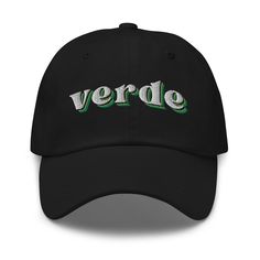 "Wear your ATX pride with a unique verde twist. For sports fans and Austin fans alike.  * 100% chino cotton twill * Curved visor * 6 embroidered eyelets * 3 ⅛\" (7.6 cm) crown * Adjustable strap with antique buckle" Green Visor Dad Hat For Streetwear, Green Curved Visor Hat For Streetwear, Green Sporty Dad Hat For Streetwear, Sporty Green Dad Hat For Streetwear, Trendy Visor Hats For Sports Events, Cotton Visor With Embroidered Logo, Cotton Fitted Visor For Sports Events, Cotton Baseball Cap For Fan Gear, Green Visor Hat With Letter Print