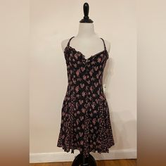 Free People Black Mini Dress With Pink Flowers. Size Medium. Nwt. Unlined Lace Up Front Top, Can Wear Open Or Tied Up. Swing Dress. Never Been Worn Nwr Pink Fitted Sundress For Date Night, Black Fitted Mini Sundress, Black Fitted Knee-length Sundress, Black Fitted Casual Sundress, Fitted Black Casual Sundress, Black Floral Print Cotton Sundress, Black Cotton Sundress With Floral Print, Lace Up Front Top, Adele Dress