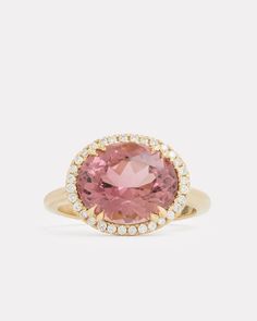 18K Yellow Gold Pink Tourmaline Oval Ring with Pave Setting, .99 TCWOrnament is 5/8 Inch Long x 1/2 Inch Wide Style# YRPOPTW Luxury Pink Oval Jewelry, Luxury Blush Oval Jewelry, Pink Sapphire Ring With Gemstone Accents, Luxury Pink Oval Halo Ring, Luxury Pink Oval Sapphire Ring, Luxury Tourmaline Jewelry With Halo Setting, Luxury Tourmaline Rings With Halo Setting, Pink Morganite Ring With Gemstone Accents, Luxury Pink Oval Diamond Ring