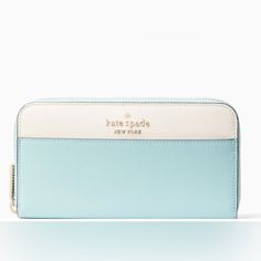 Kate Spade New Large “Staci” Wallet, Beautiful Seafoam And White Saffiano Leather, Chrome Logo And Zipper, Measures 7.7” X 3.9”, Has Lots Of Space For Bills, Cards, Zippered Coin Compartment And Slip Pocket On Back Of Wallet. New And In Excellent Condition. Kate Spade Blue Rectangular Wallet, White Kate Spade Bags With Card Slots, Kate Spade White Leather Wallet, White Rectangular Kate Spade Wallet, White Kate Spade Wallet For Everyday Use, Modern White Wallets For Travel, Modern White Travel Wallets, Formal White Bags With Card Slots, Modern White Travel Wallet