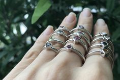 "A collection of dainty stackable tourmaline sterling silver ring in a variety of colors and shapes is sure to impress your boho friends. These are one-of-a-kind rings which we have chosen each stone and set it in a simple bezel setting with a low profile. Wrapped in a box ready for gift-giving.(r-nc-92) Choose your favorite Tourmaline Ring from the last photo We offer sizing services for a nominal fee contact us for pricing ---> Don't know your ring size? Purchase our ring sizing gauge https Pink Watermelon, Dainty Rings, Zierlicher Ring, Blue Tourmaline, Tourmaline Ring, Boho Ring, October Birthstone, Dainty Ring, October Birth Stone