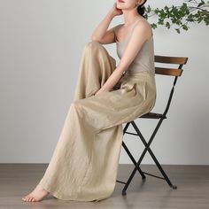 "Cool and comfortable for hot summer days, this apricot wide leg pants is elegant and stylish.    It is a wonderful wardrobe staple that's a timeless classic you'll wear again and again.  All our items are Tailored and Handmade and Made to Order ,I can make Any Size . I design new styles every week, please collect my store. I believe that you will meet your favorite styles. ★★FEATURES Tencel flax Has lining Two side pockets Front zipper closure Wide leg pants Apricot pants Casual pants Long pants Loose pants Plus size pants Perfect for Spring, Summer ★★Size Chart: ❤ Size chart is the garment's measurements, Not body measurements . Size XXS: Length: 100cm/39.37\", Waist: 62cm/24.41\" Size XS: Length: 101cm/39.76\", Waist: 65cm/25.59\" Size S: Length: 102cm/40.16\", Waist: 68cm/26.77\" Size Relaxed High Waist Pants For Spring, Relaxed High Waist Spring Pants, Baggy Wide Leg Pants For Beach, Baggy Wide Leg Beach Trousers, Summer Wide-leg Relaxed Fit Harem Pants, Casual Wide Leg Harem Pants For Summer, Relaxed Fit Summer Harem Pants, Summer Casual Wide Leg Harem Pants, Summer Relaxed Fit Harem Pants