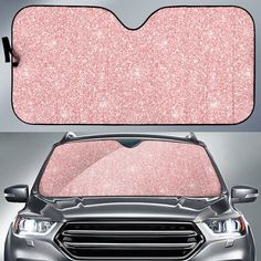 the front and back view of a car with pink glitter on it's windshield