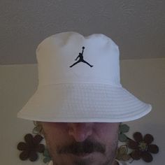 White Air Jordan adult cotton bucket hat White Adjustable Snapback Sun Hat, White Cotton Bucket Hat One Size, White Visor Bucket Hat For Outdoor, White Bucket Hat With Visor For Outdoor, White Casual Sun Hat For Outdoor, White Outdoor Visor Bucket Hat, Casual White Sun Hat For Outdoor, Casual Wide Brim Bucket Hat For Sports, Adjustable White Cotton Bucket Hat