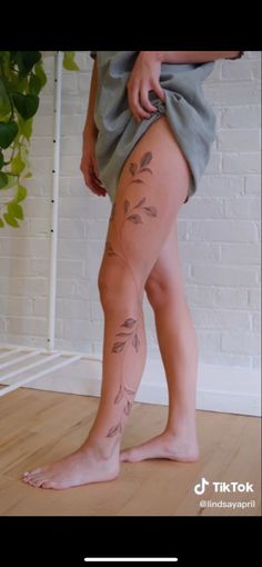 a woman's legs with tattoos on them and the words, what do you think?