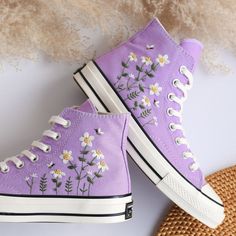 '' Custom Converse Hight Tops Chuck Taylor 1970s Embroidered Daisy Flower '' 🍀 Price includes Converse Shoes and Floral Embroidery Designs as shown 🍀 🍀 Shoe Type: Converse 1970s 🍀 Shoe color: 10. LightPurple_1970s 1. DETAILS 🍀 You can send me your Converse, Vans, canvas shoes or I can buy them for you. Custom-ordered embroidered Vans and Converse shoes, please wait another 2-4 days. Each new pair of shoes from brand's store. Each pair is HAND EMBROIDERED to order, please make sure you put in the correct shoe size before you check out. The embroidery is meticulous and does not fade. 🍀 You will receive Vans and Converse shoes with floral embroidery designs as above. 2. PERSONAL EXPRESSION 🍀 Create your unique vibe by your own design of embroidery! In addition to the embroidery pattern Grape Embroidery, Wedding Sneakers For Bride, 1970s Shoes, Embroidered Vans, Converse 1970s, Embroidered Converse, Converse Custom, Custom Converse, Embroidered Shoes