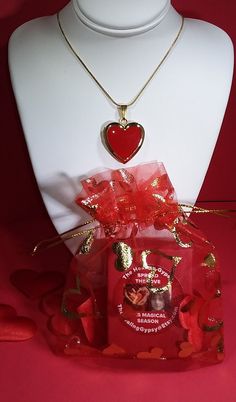 RED with Gold Heart-Shaped  Photo Locket Memory Locket  WE DO NOT PRINT THE PICTURE. Measures 1 inch wide by 1 inch high Made of Stainless steel and then Gold plated.  Opens up for photo insertion.  A FREE Felt heart is inserted as a template to help you cut your precious  photo to fit. Heart Locket is strung on a stainless steel GOLD Plated SNAKE chain 1mm wide by 45cm/ 17.7 inches long  with lobster clasp. ☆ Ready to ship! ☆ Free Jewelry gift box and reusable     gift bag are included for easy gifting!  NO RETURNS OR EXCHANGES  ACCEPTED ON THIS ITEM. Keepsake Memory Locket To remember the One you LOVE XO Red Heart-shaped Jewelry For Gifts, Valentine's Day Festive Heart-shaped Jewelry, Reusable Gift Bags, Heart Photo, Memory Locket, Felt Heart, Photo Locket, Photo Heart, Heart Locket