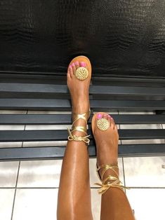 Gold Lace-up Sandals With Heel Strap For Summer, Chic Gold Ankle Wrap Sandals, Luxury Ankle Wrap Sandals For Spring, Gold Open Toe Sandals For Spring, Gold Ankle Wrap Sandals For Party, Elegant Gold Ankle Wrap Sandals, Luxury Gold Sandals For Summer, Gold Sandals With Heel And Ankle Strap, Chic Gold Sandals With Leather Sole