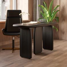 an office desk with a chair and potted plant next to it on a hard wood floor