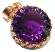 Handmade Unique 925 Sterling Silver pendant with unique one of a kind Amethyst,  11.90 grams of marvelous handcrafted jewelry design. Only one piece availble ready to ship! It's unique worldwide pendant - simply piece of art in world of fine jewelry. 15.5 carat   Perfect  Amethyst 18k Rose Gold over .925 Sterling Silver handcrafted Pendant  PENDANT DETAILS: Weight: 11.90g; Material: Sterling Silver; Main stone: Amethyst; Dimension: L- 1 1/2, W - 7/8, T- 3/8 inch; Inner Bail Diameter: 1/4 inch; Stamp / Mark: 925; Condition: New; Main color: purple; Shape: round; Collection: Pattaya;  Item Code: 17-cze-24-18 Luxury Purple Jewelry Gift, Amethyst Bezel Setting Jewelry Gift, Amethyst Jewelry With Bezel Setting For Gift, Amethyst Jewelry With Bezel Setting As Gift, Gift Amethyst Bezel-set Jewelry, Rose Gold Amethyst Pendant Jewelry, Luxury Amethyst Gemstones As Gift, Luxury Amethyst Gemstones For Gift, Luxury Purple Gemstones For Gift