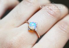 14/18K Aurora Opal Ring Gold Ethiopian Fire by MichelliaDesigns Celestial Style Opal Ring, Celestial 14k Gold Opal Wedding Ring, Magical Rose Gold Jewelry For Anniversary, Celestial Style Opal Ring With Halo For Anniversary, Celestial Opal Ring With Halo For Anniversary, Celestial Halo Opal Ring For Anniversary, Celestial Opal Ring For Anniversary, Celestial Halo Design Wedding Jewelry, Celestial Halo Jewelry For Wedding