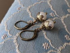 Dainty Victorian Style Pearl Drop Earrings With White Crystal Pearls and Antiqued Brass, Bridesmaid Earrings, Wedding Earrings, Gift for Her - Etsy Teardrop Pearl Earrings With Lever Back For Wedding, Classic Nickel-free Pearl Earrings For Wedding, Nickel-free Pearl Earrings For Weddings, White Pearl Earrings For Wedding With Lever Back, Elegant Cream Earrings Nickel Free, Elegant Cream Nickel-free Earrings, Classic Pearl Earrings, Earrings Wedding, Antique Earrings