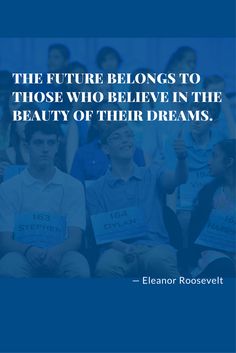 people holding signs that say the future belongs to those who believe in the beauty of their dreams