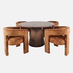 a table with four chairs around it and a round wooden table in the middle,