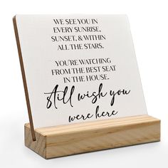 a wooden stand with a sign that says, you're watching from the best seat in the house