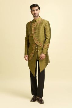 Olive green full sleeves curved panelled asymmetric kurta with flora vine resham embroidery. Paired with a pant. - Aza Fashions Long Sleeve Silk Sherwani For Reception, Formal Silk Sherwani With Traditional Drape, Elegant Silk Bandhgala For Festivals, Green Raw Silk Sherwani With Cutdana, Silk Sherwani With Traditional Drape For Receptions, Designer Silk Bandhgala With Traditional Drape, Formal Green Kurta With Dupatta, Bollywood Style Green Sherwani With Cutdana, Green Bollywood Sherwani With Cutdana